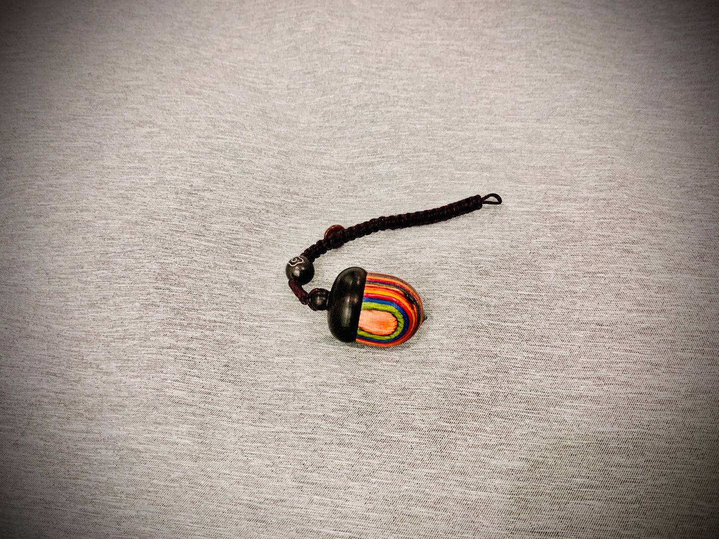 acorn wood striped multicolor black necklace chain natural woodsy outdoorsy fall autumn summer spring bright striking colorful rainbow hand painted brown large capacity mother nature secret hidden stash mini spoon thread rope bracelet striated rings